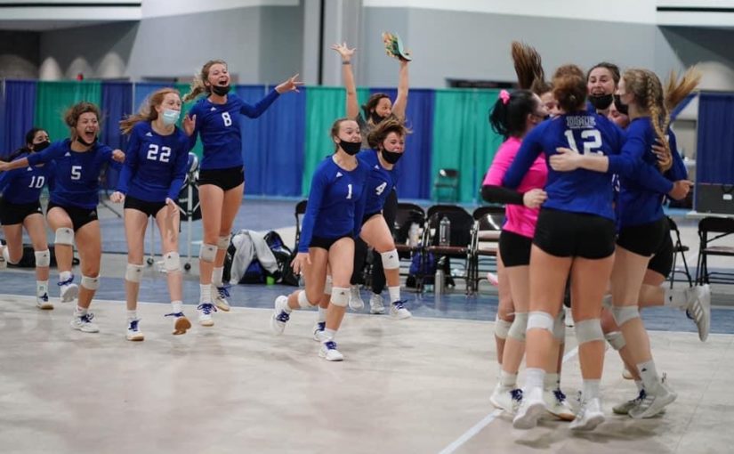 DME girls volleyball team celebration