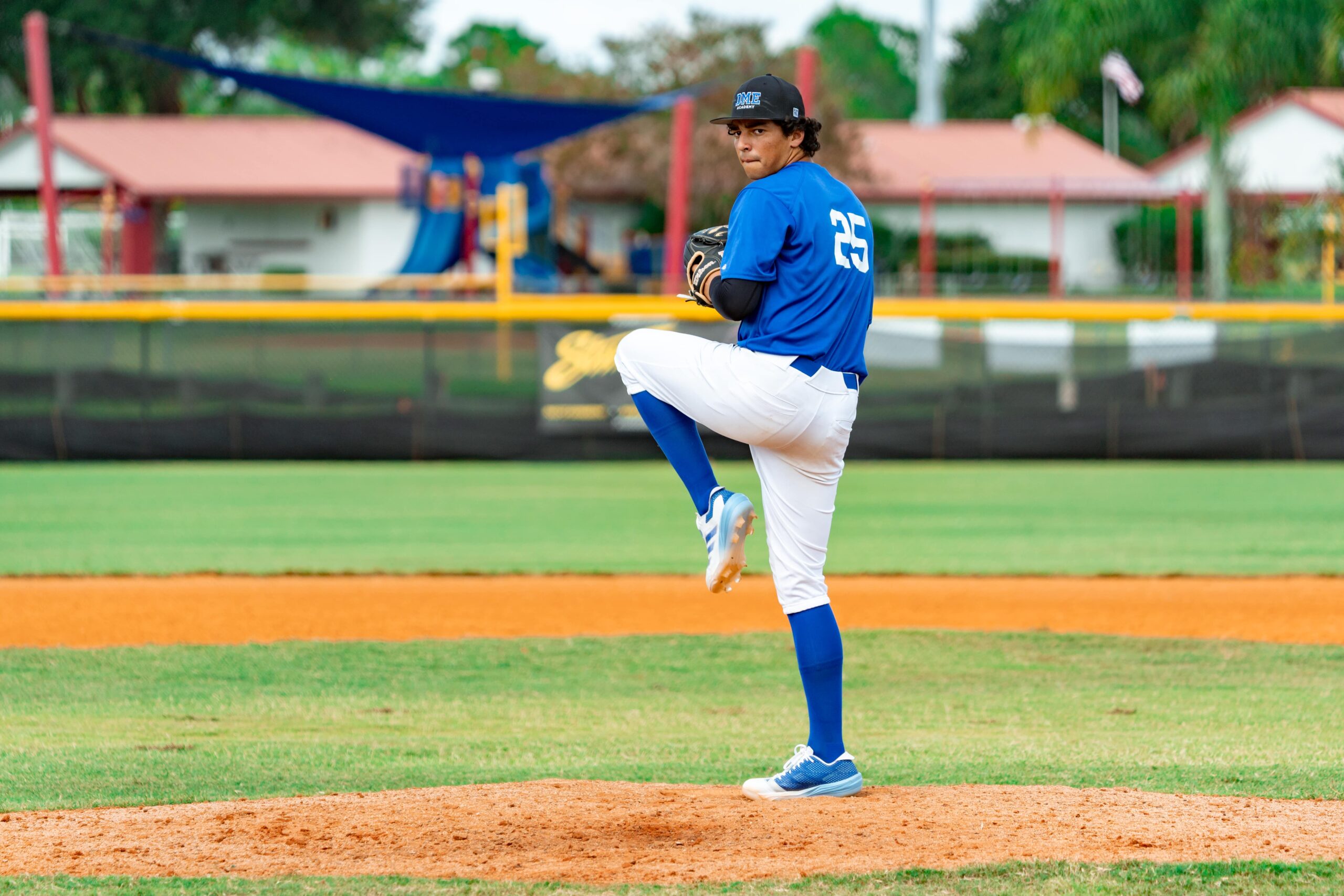 DME Academy pitcher delivers a pitch during a Florida baseball shutout win.