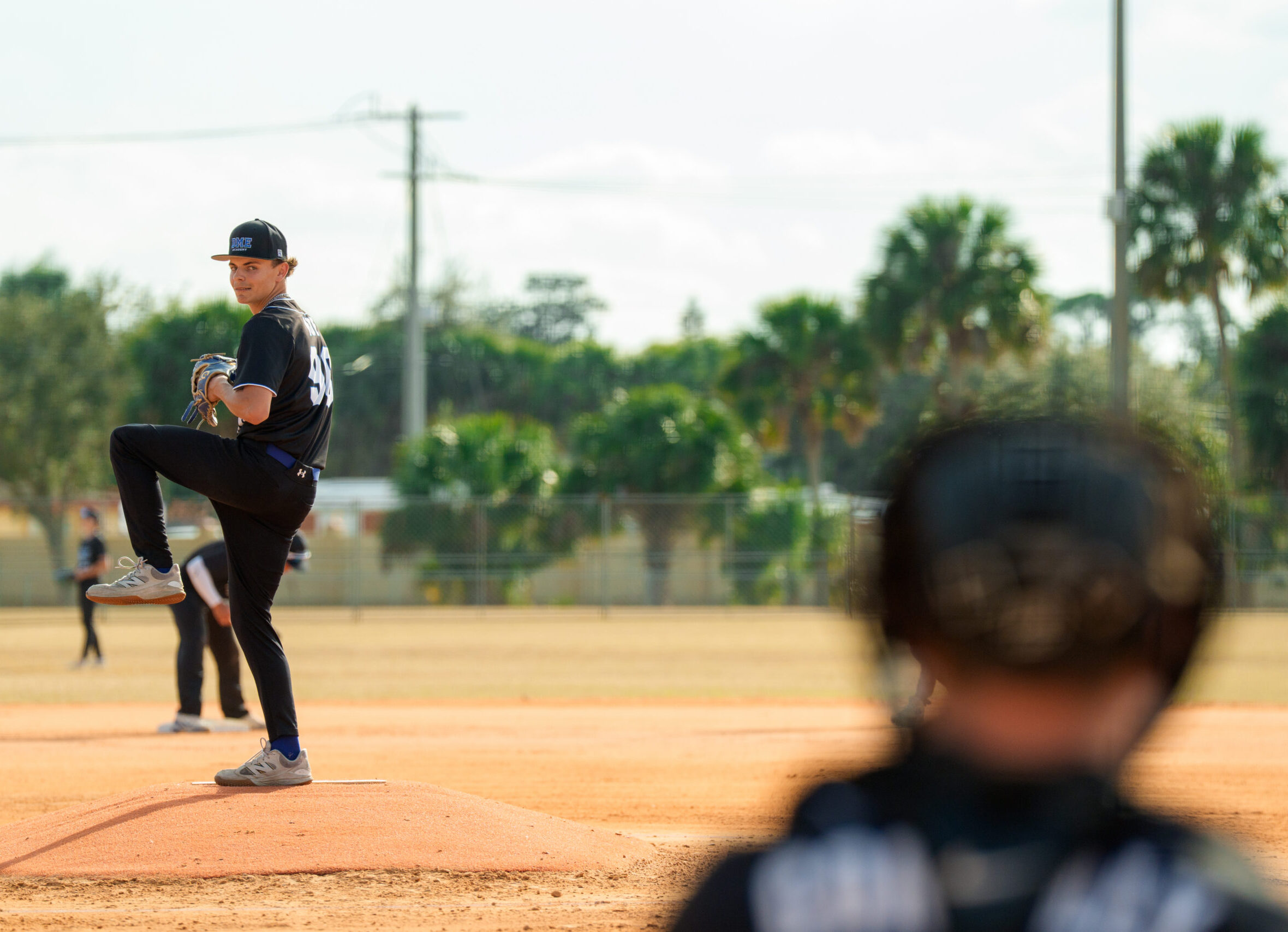 Carter Roe delivers to home plate during a win over Warner Christian Academy.