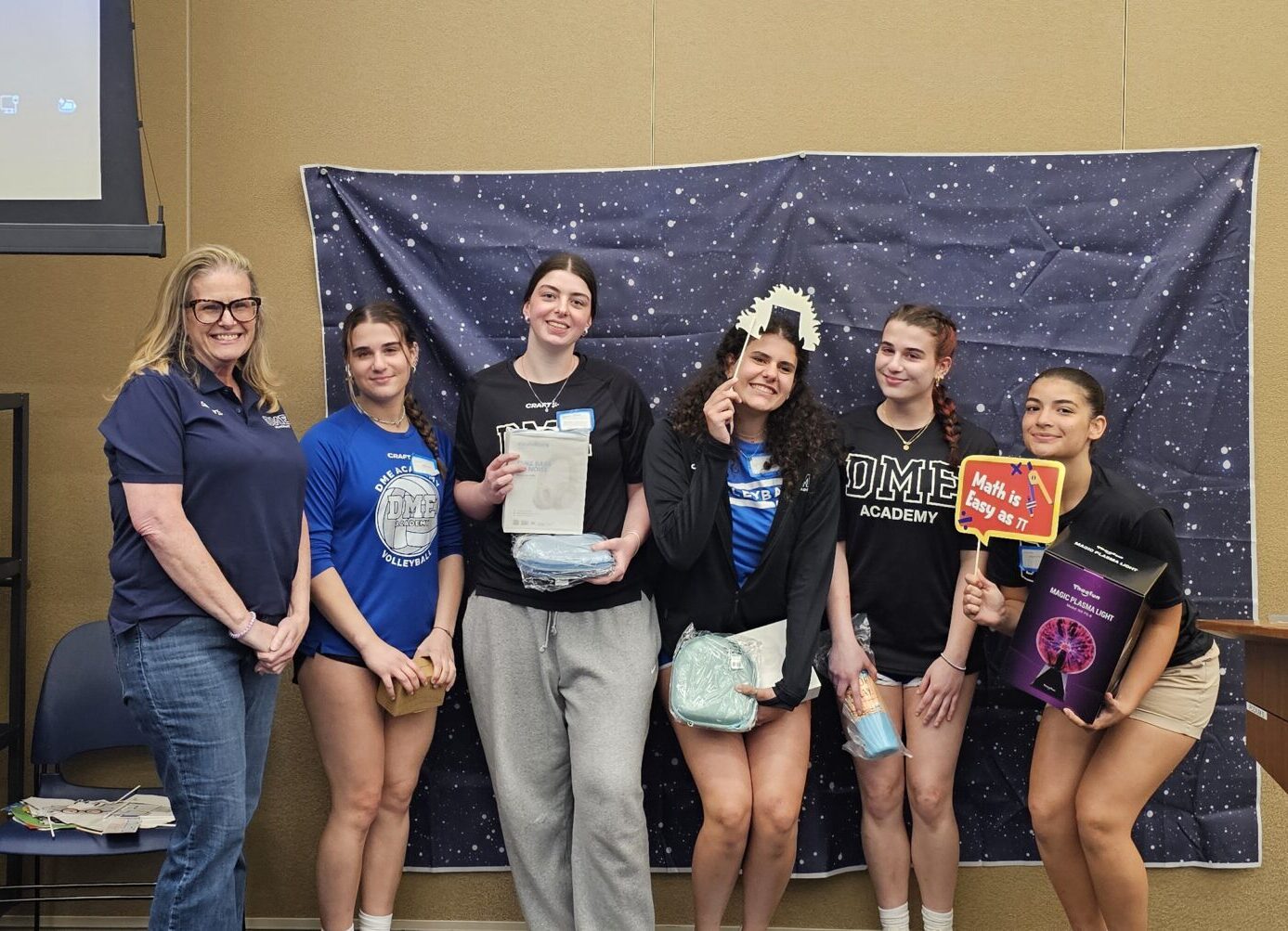A group of female students pose at the WiSER event.