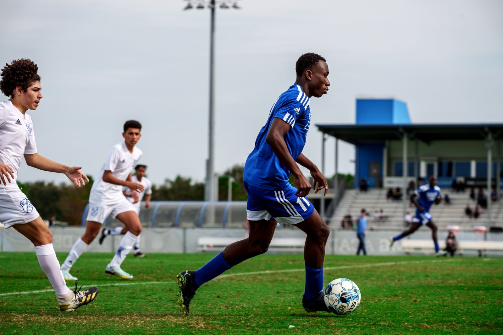 Yan Diomandé on the ball for DME Academy soccer