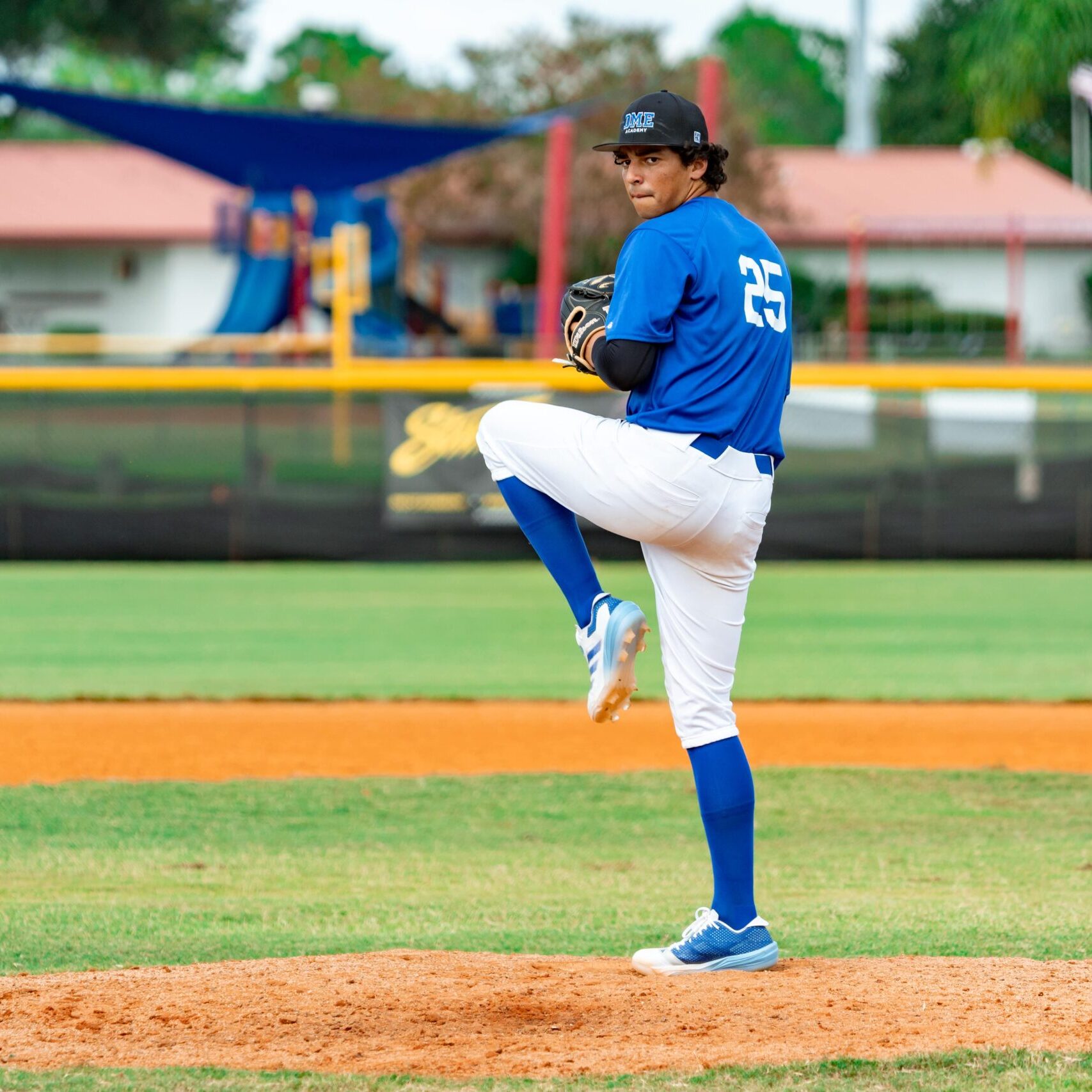 DME Academy pitcher delivers a pitch during a Florida baseball shutout win.